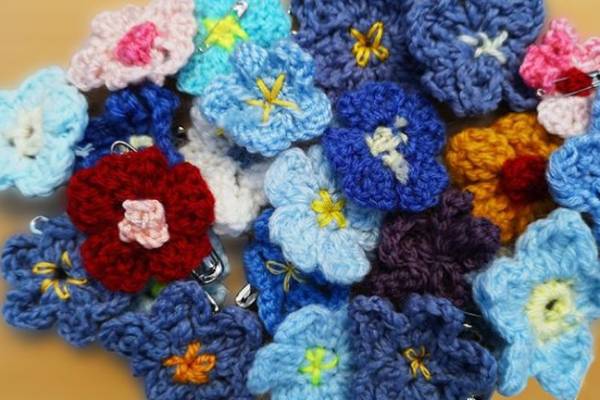 Knitted forget-me-not flowers